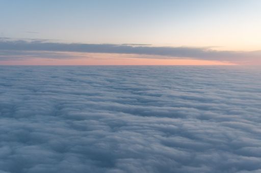 A beautiful shot of a blue sky over a cloudscape during the sunset