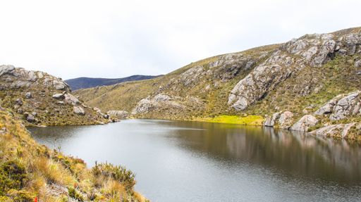 Beautiful view of Black Lagoon (Lagunas Negras) lake, Paramo de Santurban between hills at autumn in nature preserve, Colombia