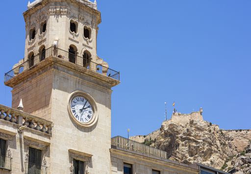 A closeup shot of the clock of the Town Hall of Alicante, Spain