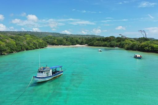 A bird's eye view of boats in the water near the beach of Diamante in the Dominican Republic