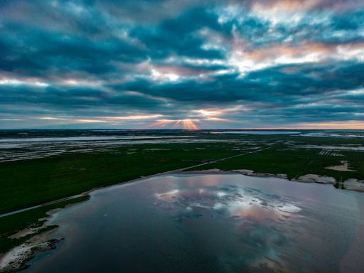Captured sunset with a drone view from Bird Reserve Vejlerne in Thy Denmark. 4k DJI Mini 3 Pro drone.
