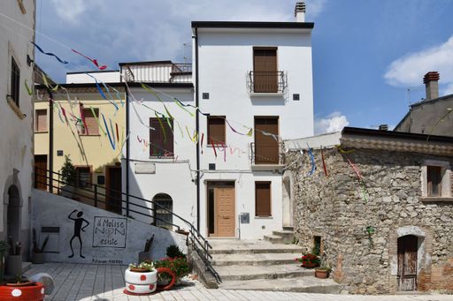 The facade of old houses in Pietracupa, a mountain village in the Molise region in Italy.