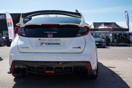 A back view of Japanese sport car Honda Civic FK2 Type-R in street