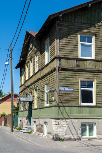 A vertical shot of an old wooden house in Tallinn, Estonia