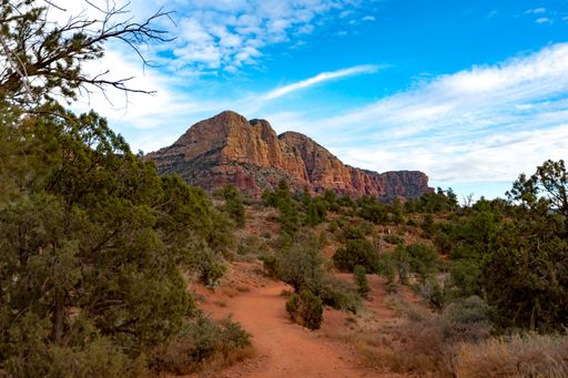 A blue sky over a red rock mountain in Sedona, Arizona, United States