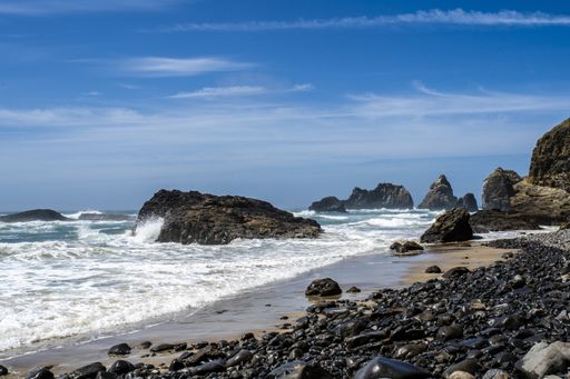 A beautiful shot of a rocky coast on a bright day in Oregon, USA