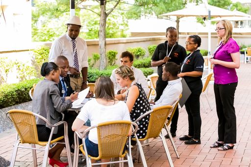 Johannesburg, South Africa - February 24, 2014: Diverse College students attending a business leadership workshop