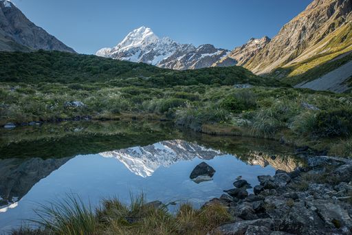A fascinating shot of the reflection of Mount Cook in New Zealand in a small lake