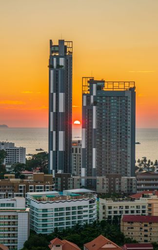 The Cityscape and the buildings of Pattaya District Chonburi Thailand Southeast Asia during the sunset time