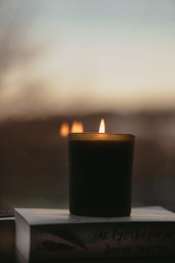 Candle light and a calm sunset, shot with a Sony mirrorless camera.