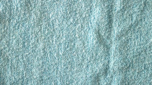 An abstract turquoise fabric texture background