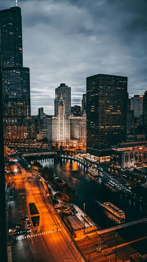 A beautiful view of the Chicago cityscape in the evening under a foggy sky