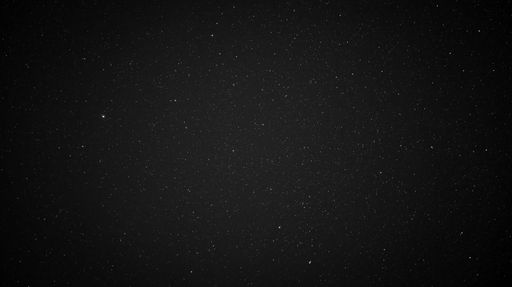 A grayscale of a sky full of stars