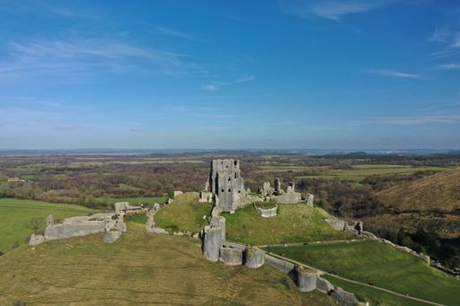 The high angle of Corfe Castle and surrounding countryside