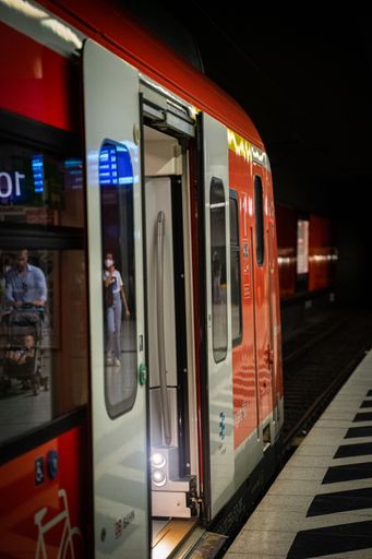 A train with open doors at the station, the S-Bahn Underground in Stuttgart, Germany.