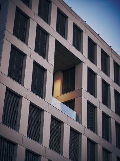 A vertical shot of a facade of modern building
