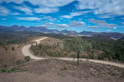 A road on hills under a cloudy sky in Razorback Lookout Flinders Ranges, South Australia