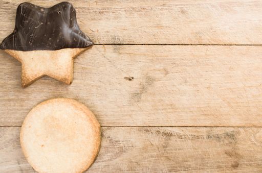A closeup shot of backed organic biscuits on a natural wood surface