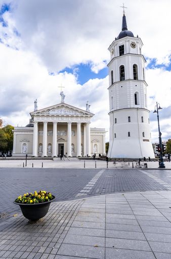 The image  shows the famous cathedral and the bell tower which is adjacent in the central square of the city
