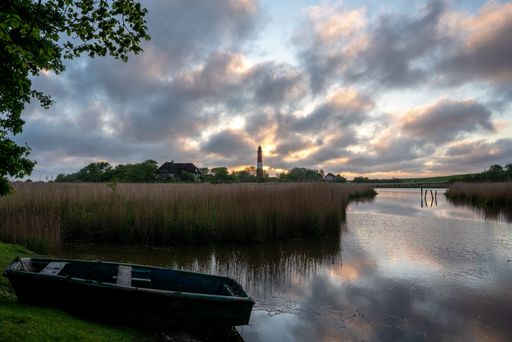 The Pellworm lighthouse at sunrise in North Frisia, Germany