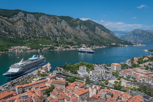 An aerial view on Kotor Bay with the medieval castle and ships