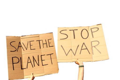 Two Cardboard Signs saying Save the planet and Stop War held by hands on a white background ready for montage