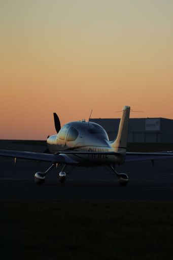 A vertical shot of Cirrus SR22 at Dinard airport