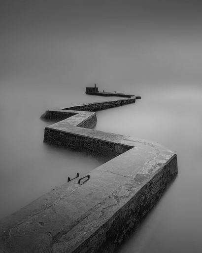 A grayscale shot of Zig Zag Pier at Saint Monans, Fife