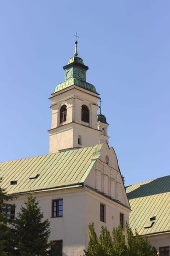 A vertical shot of an ancient Christian church at a sunny summer day in Lublin, Poland
