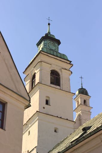 A low-angle vertical shot of the facade of the Saint Paul's church in Lublin, Poland