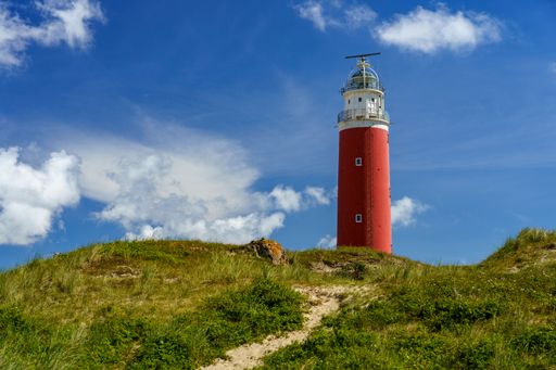 A beautiful shot of Lighthouse Texel on a sunny day in De Cocksdorp, Netherlands
