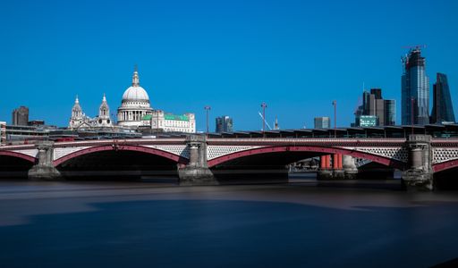 Picture was taken during a sunny afternoon in London. It is Long exposure with 10-stop filter capturing both the Cathedral and bridge in the same pic.