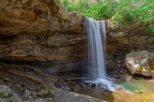 The long-exposure view of Cucumber Falls on a sunny day in Ohiopyle State Park