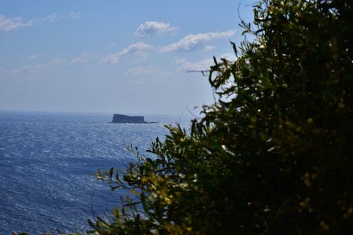 The small island of Filfla in the distance, as seen from the Maltese coast.
