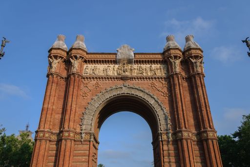 Vertical shot of the Arc de Triomf in Barcelona Spain with beautiful blue sky