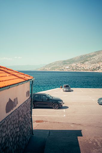 A vertical shot of a parking lot by the sea in Senj, Croatia