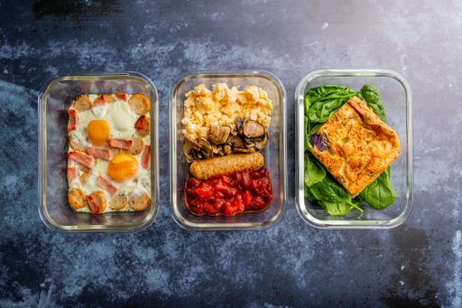 A top view of different dishes in glass bowls