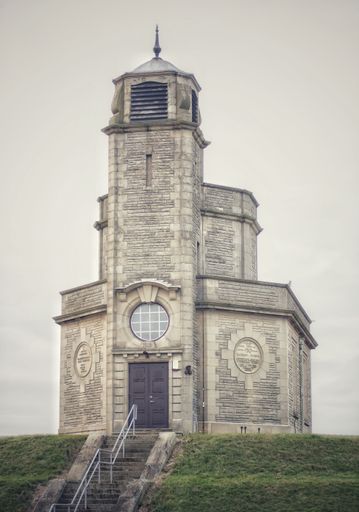 A vertical shot of Bracebridge Heath reservoir in Lincolnshire, England, in daylight