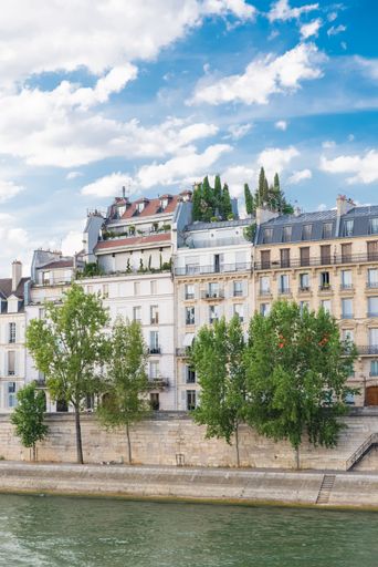 Paris, view of ile saint-louis and quai d'Orleans, typical facades and quays in spring