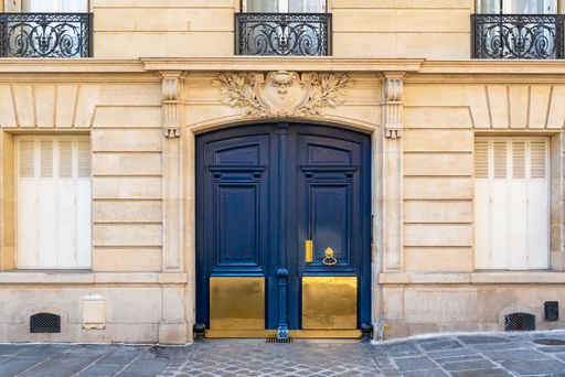 Paris, an old wooden door, typical building in the Marai