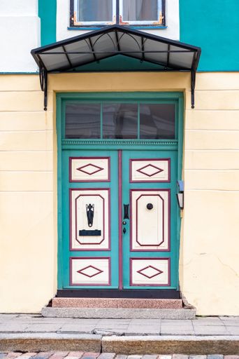 Tallinn in Estonia, wooden colorful door in the medieval city, typical house