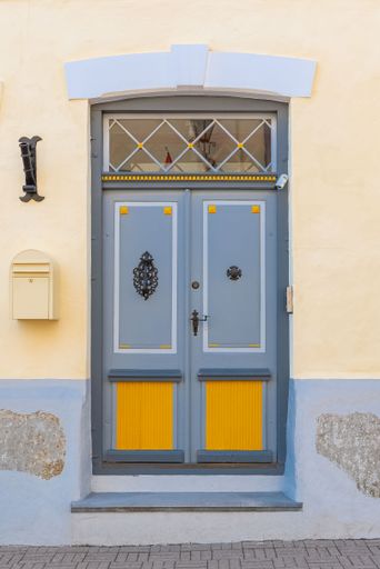 Tallinn in Estonia, wooden colorful door in the medieval city, typical house