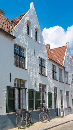 Bruges in Belgium, beautiful typical houses in an ancient street
