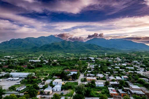 A beautiful cityscape view with cloudy sky at sunset