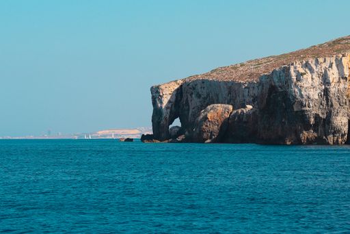 Elephant Rock Formation in Comino, Malta, tourist attraction, concept