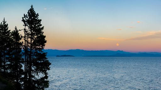 a scenic sunset on Jenny Lake in Grand Teton National Park, Wyoming