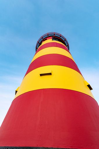 A vertical low angle shot of the Pilsum lighthouse in Germany