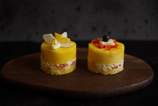 A closeup shot of cheesecakes on wooden table