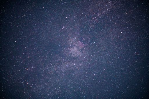 A beautiful shot of a starry blue galaxy night sky