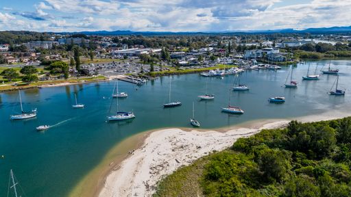 An aerial view of the city and boats in Port Macquarie, New South Wales, Australia